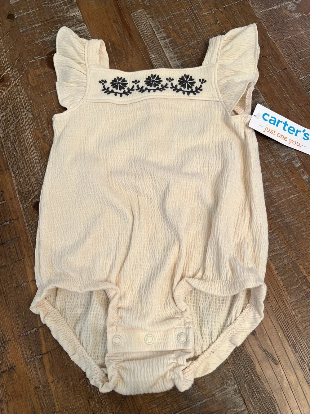 Carter's Cream Flutter Romper with Black Floral Stitching